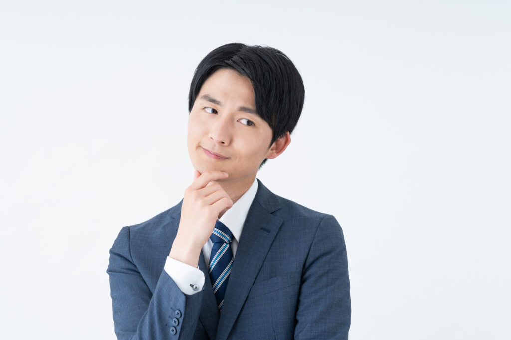 悩むビジネスマン