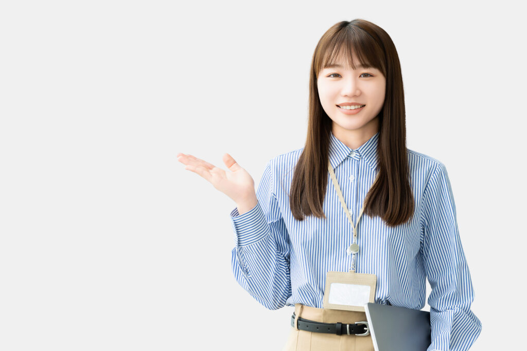 手で案内をする女性