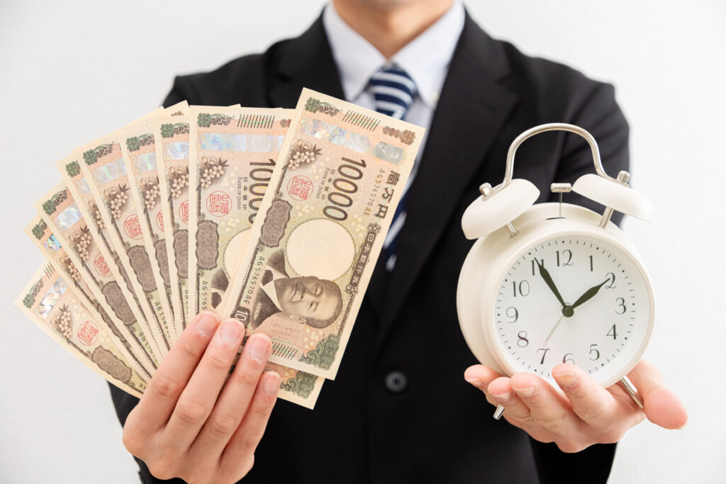 お金と時間とビジネスマン