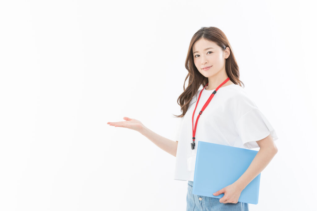 ビジネスウーマン 指差し 手のひら