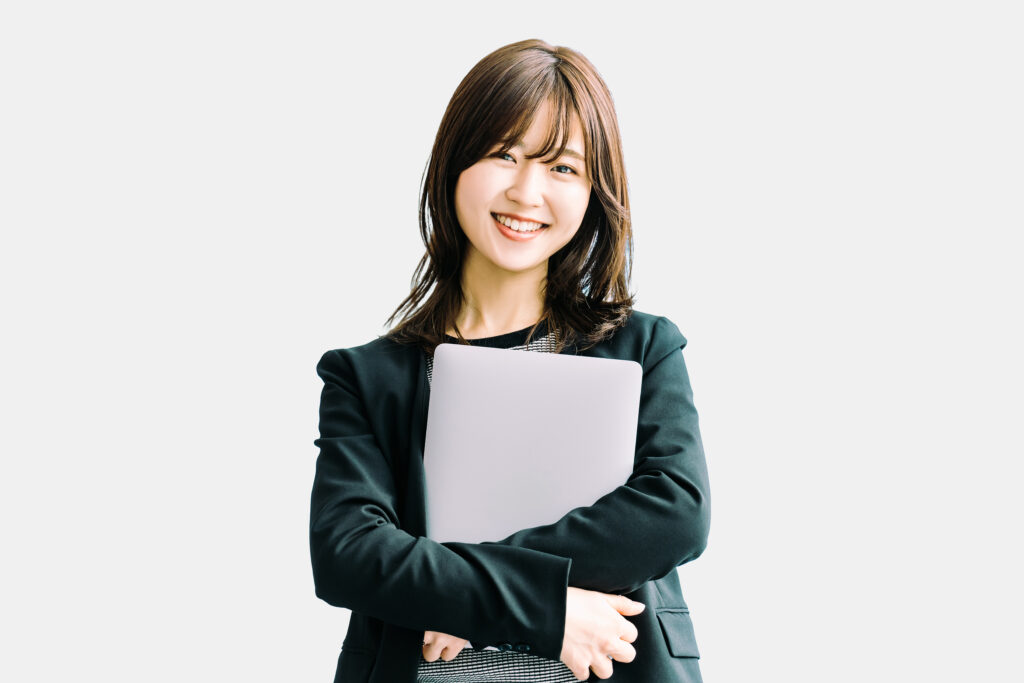 パソコンを持つ女性