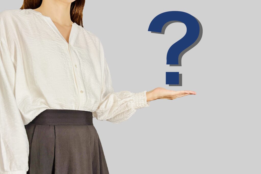 はてなマークとビジネスウーマン