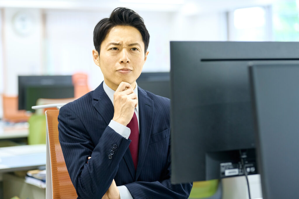 考えるビジネスマン
